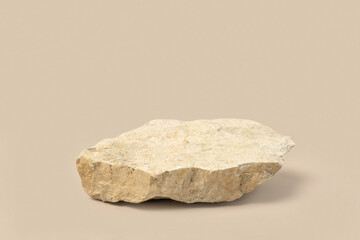 Stone podium for show cosmetics product presentation. Abstract minimal backdrop. One rock form. Beige Nude Studio Background. Scene. Showcase display case. 3D Front View. Trendy neutral color. Space