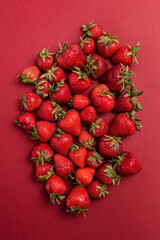 strawberries on a red background