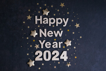 Happy New Year 2024. Golden numbers 2024 with gold stars on a dark background. New Year greeting card