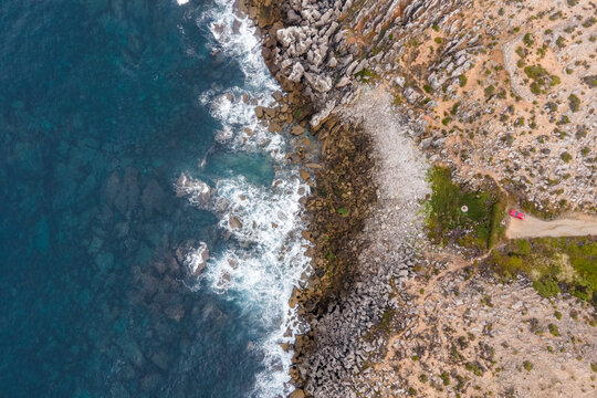 Aerial view of the cliffs in Cabo Carvoeiro along the Atlantic Ocean coastline in Peniche, Leiria, Portugal.