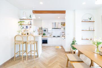 Minimalistic modern kitchen in pastel colors with kitchenware and space