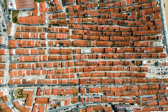 Aerial view of Nazaré, a small town with houses in a row, Leiria district, Portugal.