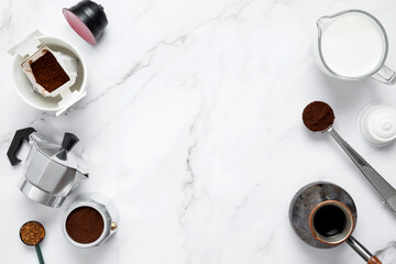 Ingredients for making coffee. Different ways to make coffee geyser moka maker,  metal cezve, coffee machine capsules, drip. Coffee making concept. Flat Lay. Top view. Copy space