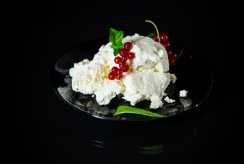 Natural homemade cottage cheese in a plate
