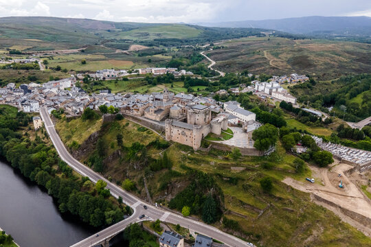 Aerial view of Puebla de Sanabria, a small town with a medieval castle along the Rio Tera river in Zamora, Spain.