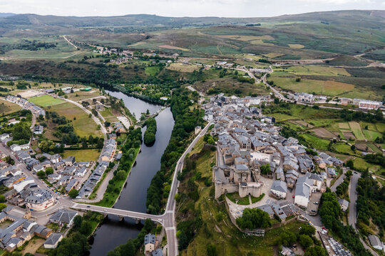 Aerial view of Puebla de Sanabria, a small town with a medieval castle along the Rio Tera river in Zamora, Spain.
