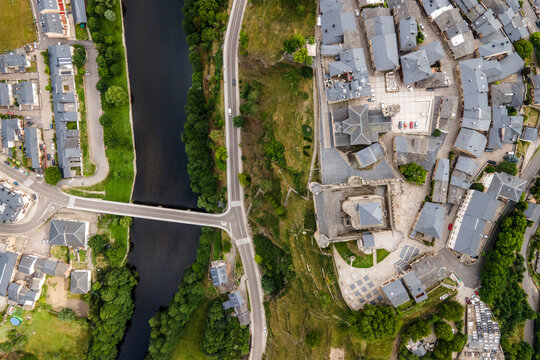 Aerial view of Puebla de Sanabria, a small town with a medieval castle along the Rio Tera river in Zamora, Spain.