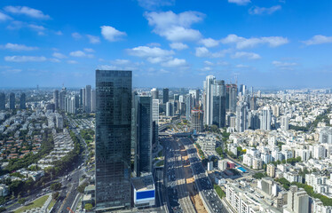 Israel, Tel Aviv financial business district skyline with shopping malls and high tech offices.