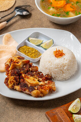 Grilled beef ribs with bbq sauce and rice