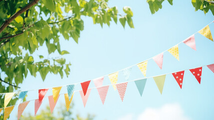 Colorful pennant string decoration in tree