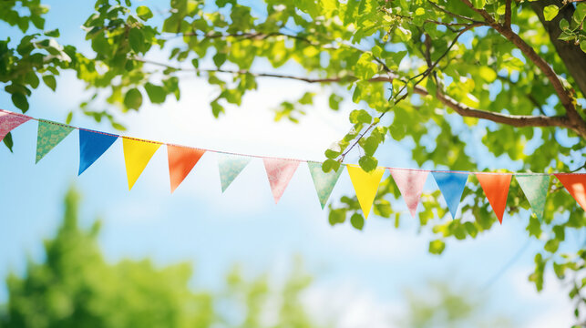 Colorful pennant string decoration in tree