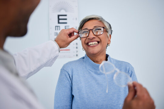 Glasses, doctor or happy old woman in eye test assessment for healthcare, wellness or vision examination. Smile, visual or mature client testing a optician or optometrist in optometry consultation