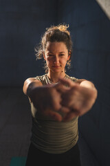 One adult caucasian woman stretch yoga practice in summer day outdoor