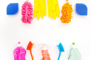 Flat lay of sprey bottles and cleaning products, top view