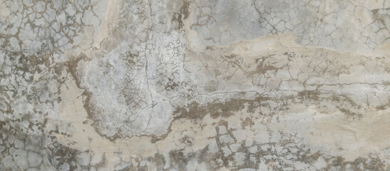 The texture of the old cement wall with silver paint, the background of the old wall of silver cement paint, taken from a close-up angle