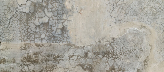 The texture of the old cement wall with silver paint, the background of the old wall of silver cement paint, taken from a close-up angle