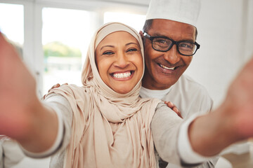 Selfie, Islam and old couple in home with smile, happy culture and love in living room in...