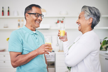 Happiness, senior couple and juice with love in kitchen for bonding in retirement or morning. Marriage, home and elderly man or woman with beverage with conversation together for quality time.