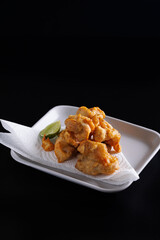 Chicken Karaage Japanese Fried chicken isolated in black background