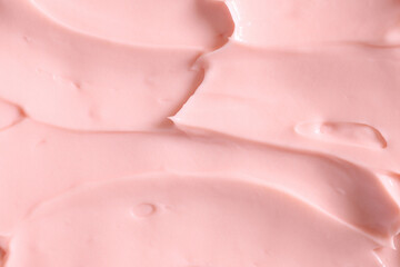Pink skin care cosmetic beauty cream texture background in close up - 622755091