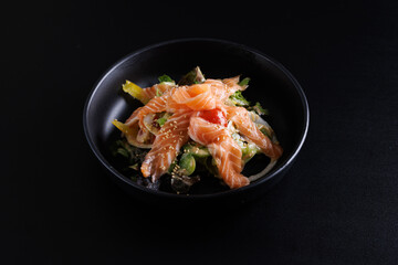 Japanese salad isolated in black background