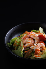 Japanese salad isolated in black background