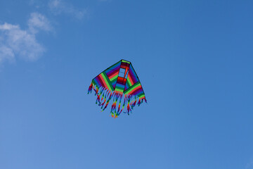 Photograph of colorful comet in the blue sky. Concept of objects and entertainment.