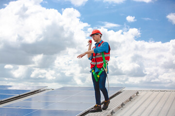 Elegant engineer holding a walkie talkies to working in determined and has a vision like a leader, Discussion and coordination between departments about problem solving, blue collar concept