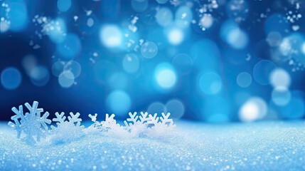 Fototapeta na wymiar Snow winter bokeh glow blue background for Christmas wallpaper