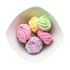 Very colorful meringues placed in a white bowl, on a white background. Pastel green, purple, pink and yellow colors with sprinkles on them. Transparent PNG
