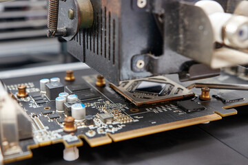 Infrared soldering station setup and GPU chip desoldering process. Maintenance and repair of...