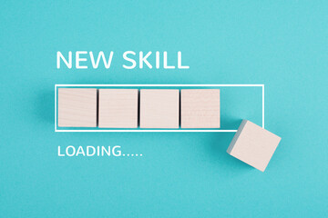 Progress bar with the words new skill loading, education concept, having a goal, online learning, knowledge is power strategy
 - obrazy, fototapety, plakaty