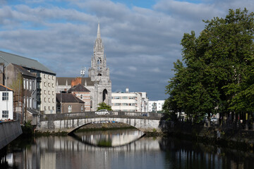 Fototapeta na wymiar Cityscape of cork city with holy trinity church and lee river. Ireland Europe