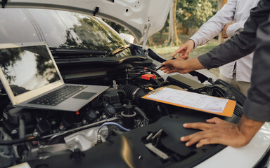 mechanic checking engine security testing tools before customers travel far
