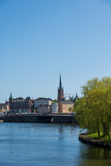 Obraz premium Stockholm old town seen from other side of the water on summer in Sweden