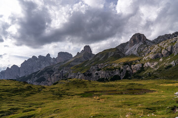 Fototapeta na wymiar Stunning mountain views. Picturesque landscape with beautiful sharp rocks and dark storm clouds. Beautiful mountain landscape. Dolomites. Italy.