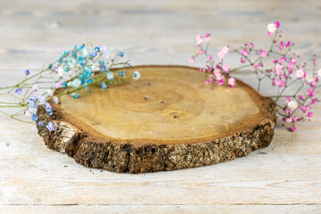 Nature at Home: Natural Charms on a Wooden Table with Gypsophila Blossoms