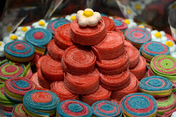 Fototapeta na wymiar multi-colored candies for sale on a shop window.