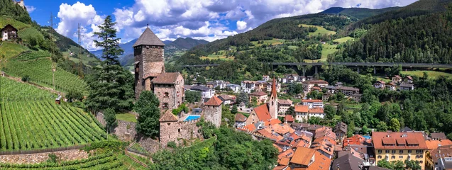 Poster Scenic beautiful places of northern Italy. Charming village Chiusa . panoramic arerial view with medieval castle Branzoll.  South Tyrol, Bolzano province © Freesurf