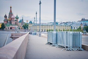 Portable temporary fence parts on sidewalk near Red Square in Moscow. Preparation for roads and...