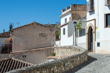 Walking in historic center in Granada, Spain on April 5, 2023