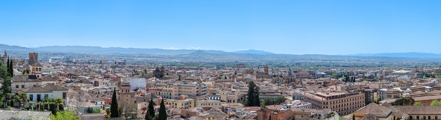 Fototapeta na wymiar Panoramic view of city center in Granada, Spain on April 5, 2023