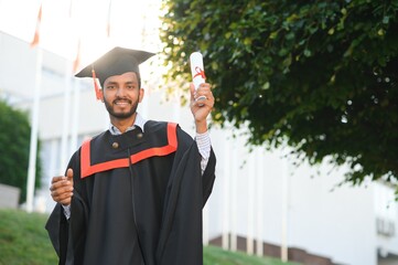 Indian university male student celebrating graduation