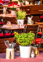 table and chairs at a typical bavarian beergarden