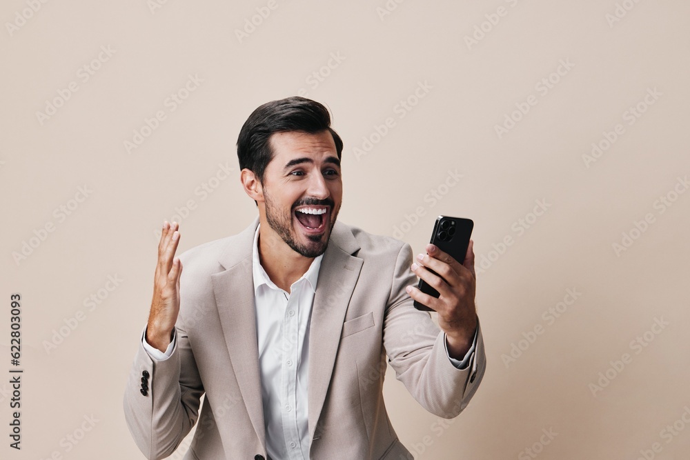 Wall mural man suit portrait call business adult smile hold happy phone smartphone