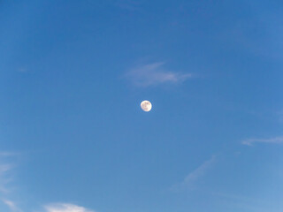 A day time moon on a clear day