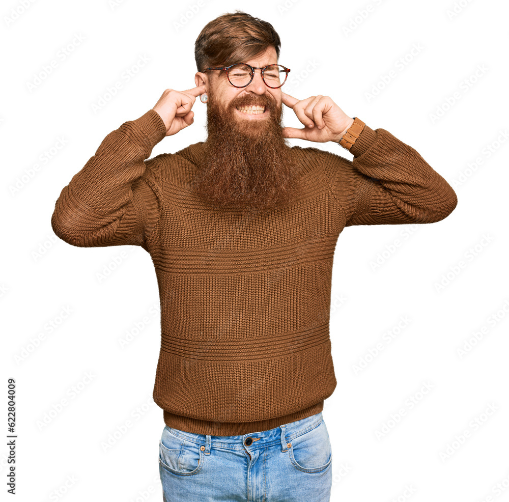 Canvas Prints young irish redhead man wearing casual clothes and glasses covering ears with fingers with annoyed e