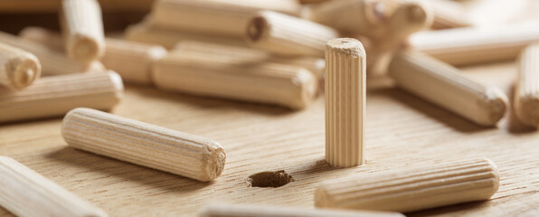 hole in wooden oak board for wooden dowel. carpentry industry.