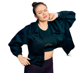 Young hispanic girl wearing sportswear stretching back, tired and relaxed, sleepy and yawning for early morning