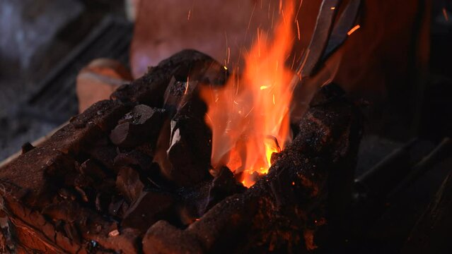 They forge iron. Media. They work with iron on the street at a split temperature